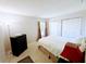 Neutral bedroom with carpeting, closet, and window for natural light at 21298 Sw Peach Blossom St, Dunnellon, FL 34431