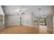Spacious living room with hardwood floors, neutral-colored walls, and lots of natural light at 23 Larch Crse, Ocala, FL 34480