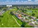 Aerial shot showcases home's location near golf course, community pool, and clubhouse at 2478 Nw 53Rd Avenue Rd, Ocala, FL 34482