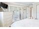 Bright bedroom boasts white furnishings and vertical blinds for a serene and comfortable atmosphere at 2478 Nw 53Rd Avenue Rd, Ocala, FL 34482