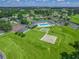 An aerial shot of community amenities including a pool, tennis courts and impeccable landscaped grounds at 2478 Nw 53Rd Avenue Rd, Ocala, FL 34482