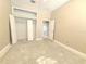 Bedroom with walk in closet, neutral colored walls, and an ensuite bathroom at 2515 Se 19Th Cir, Ocala, FL 34471