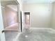 Bedroom showcasing an ensuite bathroom and arched doorway leading to other rooms at 2515 Se 19Th Cir, Ocala, FL 34471