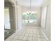 Charming dining area with large windows offering backyard views and great natural lighting at 2515 Se 19Th Cir, Ocala, FL 34471