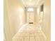 Welcoming entryway features tiled floors, high ceilings, and decorative moldings at 2515 Se 19Th Cir, Ocala, FL 34471