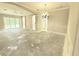 Spacious living room with open floor plan, decorative columns and ample natural light at 2515 Se 19Th Cir, Ocala, FL 34471