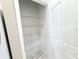 Pantry with wire shelves providing ample storage space for food and household items at 2515 Se 19Th Cir, Ocala, FL 34471