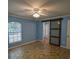 Bedroom with a sliding door and a window bringing in natural light at 3065 Se 142Nd Ln, Summerfield, FL 34491