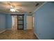 Bedroom leading to bathroom with a sliding door and a view to another room at 3065 Se 142Nd Ln, Summerfield, FL 34491