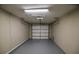 View of the garage with an open garage door at 3065 Se 142Nd Ln, Summerfield, FL 34491