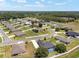 See this lovely home nestled within a well-planned community, featuring a pool and manicured lawns at 3612 Se 47Th Ter, Ocala, FL 34480