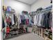 Spacious walk-in closet with ample shelving, hanging storage, and organized compartments at 3612 Se 47Th Ter, Ocala, FL 34480