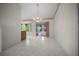 Spacious living area with an open floor plan and sliding glass doors at 4992 Nw 31St St, Ocala, FL 34482
