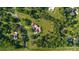 Overhead view showcases the home's private lot surrounded by mature trees and greenery at 6381 Sw 21St Court Rd, Ocala, FL 34471