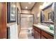 Well-appointed bathroom with tiled walk-in shower and vanity at 6381 Sw 21St Court Rd, Ocala, FL 34471