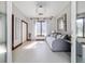 Bright bedroom with a daybed, natural light, and decorative mirror at 6381 Sw 21St Court Rd, Ocala, FL 34471