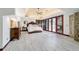 Spacious main bedroom features an elegant tray ceiling and a private patio at 6381 Sw 21St Court Rd, Ocala, FL 34471