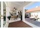 Expansive covered patio with multiple seating areas, ceiling fans, and seamless access to the pool area at 6381 Sw 21St Court Rd, Ocala, FL 34471