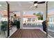 Covered patio offers a view of the sparkling pool and lush landscaping for ultimate relaxation and outdoor enjoyment at 6381 Sw 21St Court Rd, Ocala, FL 34471