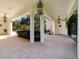Elegant porte cochere with brick paving and lush landscaping at 6381 Sw 21St Court Rd, Ocala, FL 34471