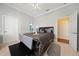 Bedroom with a king-sized bed, an ensuite bathroom and neutral carpet at 645 Sw 48Th Ln, Ocala, FL 34471