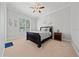 Bedroom with neutral walls, carpet floors, and a ceiling fan at 645 Sw 48Th Ln, Ocala, FL 34471