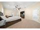 Spacious bedroom featuring neutral color palette, ceiling fan, and ample natural light at 645 Sw 48Th Ln, Ocala, FL 34471