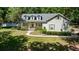 Charming single-Gathering home with dormer windows and a welcoming front porch and landscaped front yard at 645 Sw 48Th Ln, Ocala, FL 34471