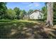 Charming two-story home with lush landscaping and a large, well-maintained front yard at 645 Sw 48Th Ln, Ocala, FL 34471