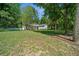 Charming home with a well-manicured lawn and mature trees, offering a serene and inviting curb appeal at 645 Sw 48Th Ln, Ocala, FL 34471