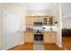 Traditional kitchen features light wood cabinetry, stainless steel appliances, and granite countertops at 645 Sw 48Th Ln, Ocala, FL 34471
