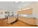 Well-lit kitchen with stone countertops and plenty of cabinet space at 645 Sw 48Th Ln, Ocala, FL 34471