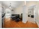 Cozy living room with hardwood floors, neutral tones, and an inviting atmosphere at 645 Sw 48Th Ln, Ocala, FL 34471