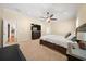 Spacious main bedroom featuring neutral colors, carpet flooring, and a large dresser at 645 Sw 48Th Ln, Ocala, FL 34471