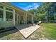 Inviting outdoor patio with ample seating and a fire pit, perfect for relaxation and outdoor gatherings at 645 Sw 48Th Ln, Ocala, FL 34471