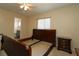 Bedroom featuring carpet floors, neutral walls, lots of natural light and ensuite bathroom at 6472 Sw 106Th Pl, Ocala, FL 34476