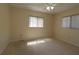 Bright bedroom featuring carpet floors, neutral walls, and a ceiling fan with light fixture at 6472 Sw 106Th Pl, Ocala, FL 34476