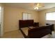 Bedroom featuring carpet floors, neutral walls, and lots of natural light from the windows at 6472 Sw 106Th Pl, Ocala, FL 34476