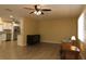 This living room has wood floors, natural light, open concept to the updated kitchen at 6472 Sw 106Th Pl, Ocala, FL 34476