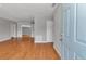 Inviting entryway with hardwood floors and neutral paint, leading to open living spaces at 6820 Se 108Th St, Belleview, FL 34420
