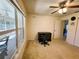 Bright room with large windows, offering space for a desk, with view to screened patio at 7134 Sw 129Th Terrace Road, Ocala, FL 34481
