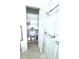 Organized closet with shelving and accessibility bars at 7134 Sw 129Th Terrace Road, Ocala, FL 34481