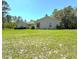 Well-maintained home with a spacious front lawn and verdant landscaping in a serene neighborhood at 7134 Sw 129Th Terrace Road, Ocala, FL 34481
