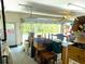 Spacious garage provides ample storage space, with an open door leading to the outdoors at 7134 Sw 129Th Terrace Road, Ocala, FL 34481