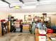 Organized garage space provides ample storage with shelving, perfect for tools and household items at 7134 Sw 129Th Terrace Road, Ocala, FL 34481