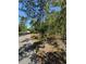 Scenic lot ready for construction on a quiet road with mature trees for privacy at 7134 Sw 129Th Terrace Road, Ocala, FL 34481