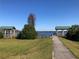 Scenic waterfront view with lakeside park and dock at 7134 Sw 129Th Terrace Road, Ocala, FL 34481