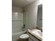 Bathroom featuring a shower and bath combination with a white subway tile surround at 74 Pine Trace Crse, Ocala, FL 34472