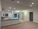 Open living space with carpeting, recessed lighting, and an eat-in kitchen at 74 Pine Trace Crse, Ocala, FL 34472