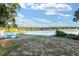 Backyard with lake access, and room to play or relax by the water at 754 Se 167Th Court Rd, Silver Springs, FL 34488
